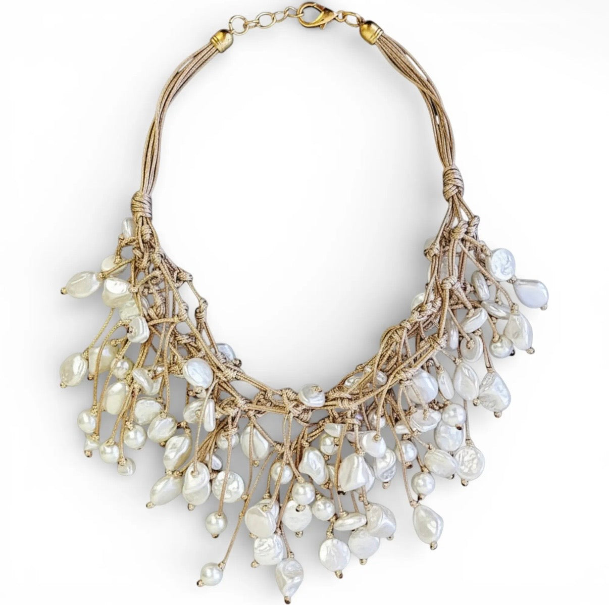 Handgeknoopte statementketting met ivoorkleurige parels