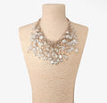 Handgeknoopte statementketting met ivoorkleurige parels